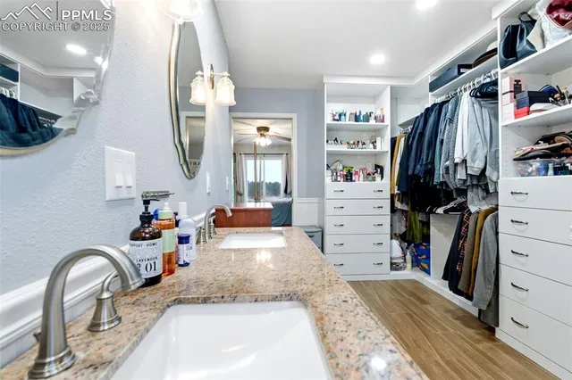 a kitchen with a refrigerator and a sink