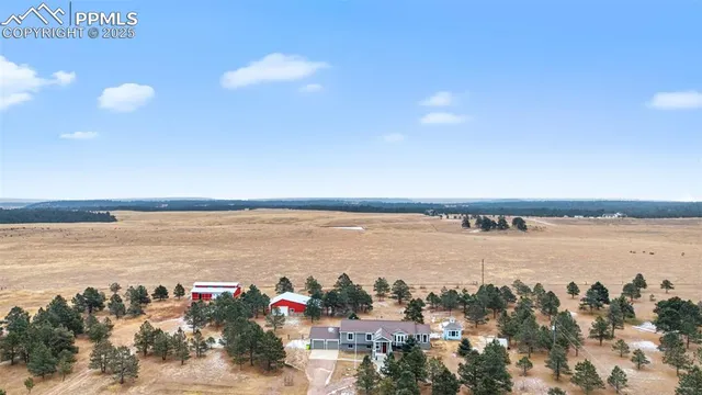 a view of a livingroom with furniture and a dishwasher and furniture