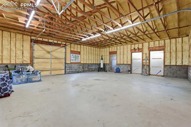a front view of house with garage and yard