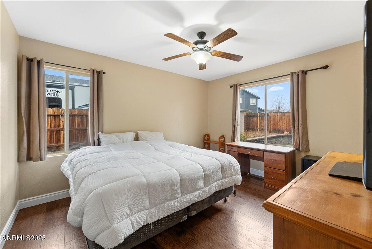 7245 Winterhill Court Reno, NV 89523 - Photo 11 of 25 a bedroom with a bed and a window