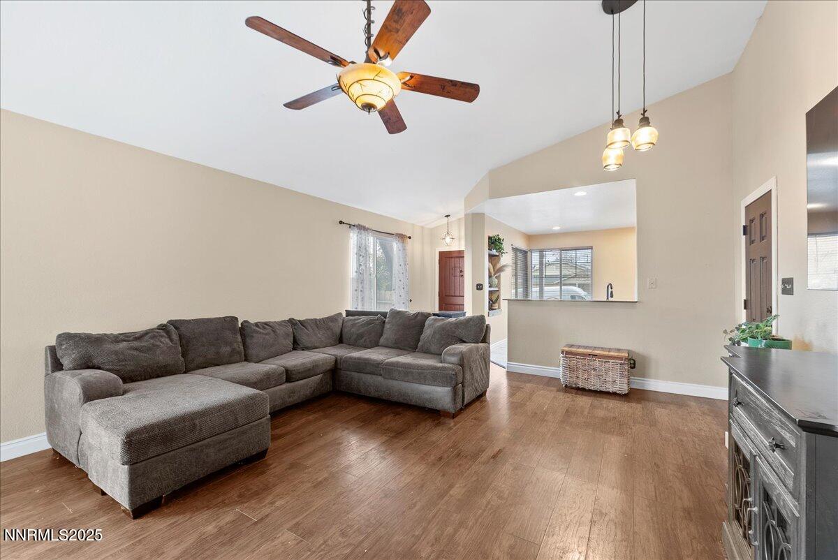 7245 Winterhill Court Reno, NV 89523 - Photo 6 of 25 a living room with furniture and a wooden floor