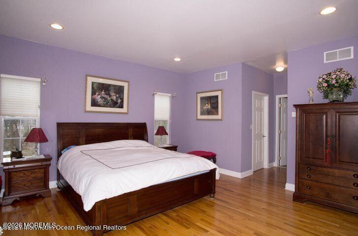 467 Leesville Road Jackson, NJ 08527 - Photo 11 of 19 a bedroom with a bed and a dresser