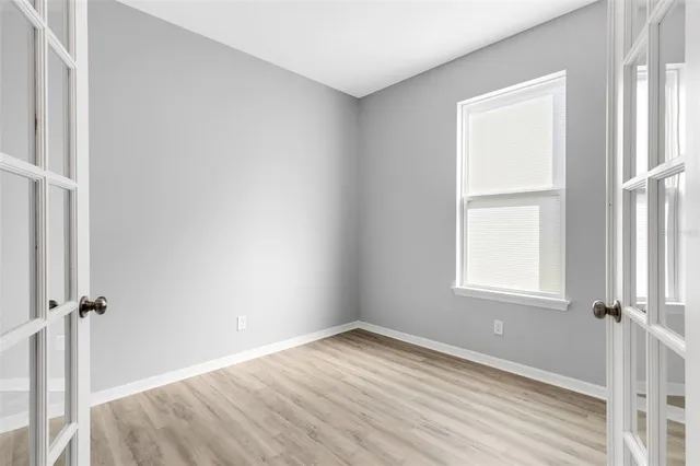 a close view of a sink and cabinets