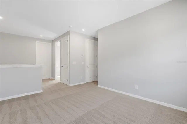 a bathroom with a granite countertop sink toilet tub and shower