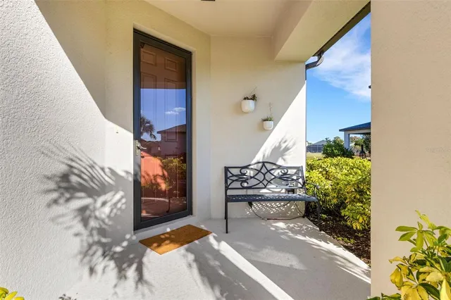 a kitchen with a refrigerator sink and cabinets