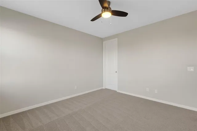 a view of a patio with couches table and chairs and potted plants