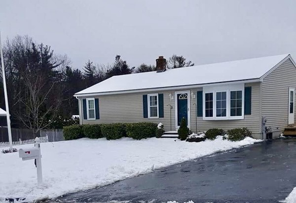 3 Rolling Ridge Road Rutland, MA 01543 - Photo 1 of 10 a front view of a house with garden