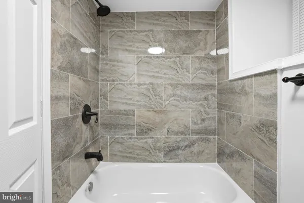a bathroom with a bathtub