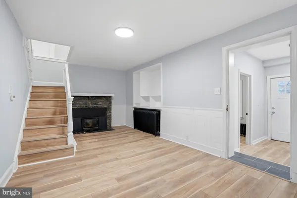 a view of a livingroom with a fireplace