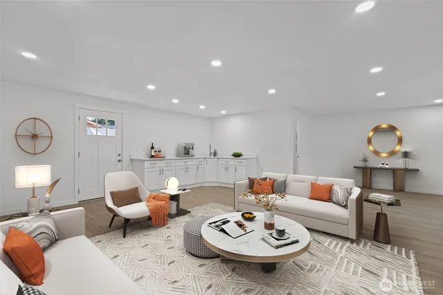 a living room with furniture and a table