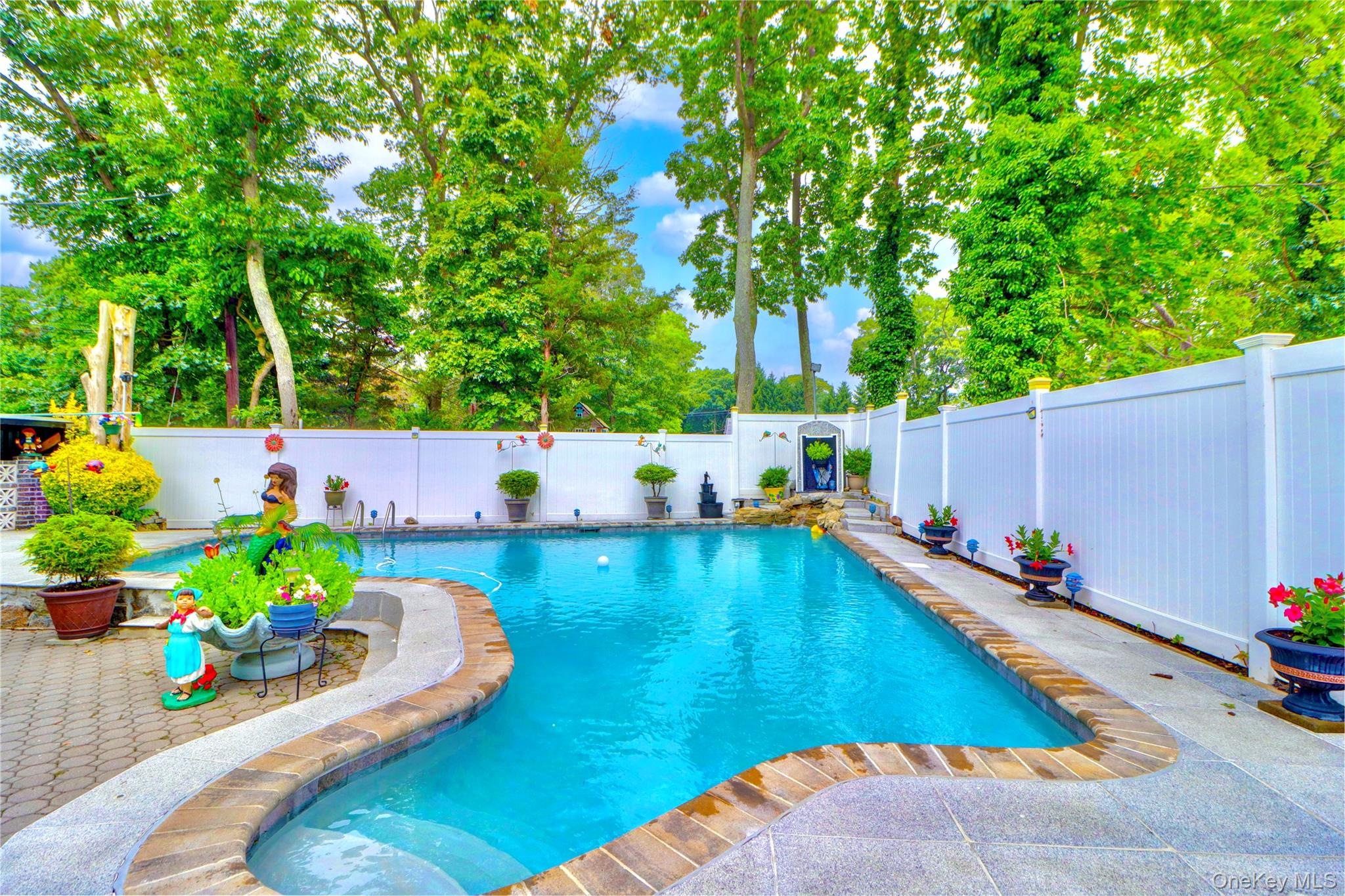 338 Cold Spring Road Syosset, NY 11791 - Photo 21 of 22 View of swimming pool featuring a fenced backyard and a patio area