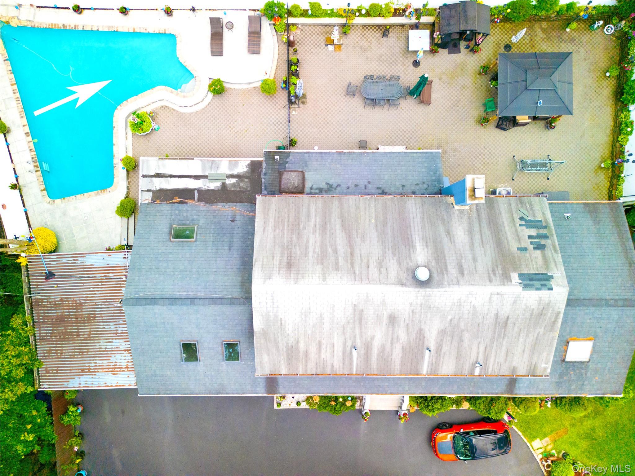 338 Cold Spring Road Syosset, NY 11791 - Photo 22 of 22 Aerial view of a pool