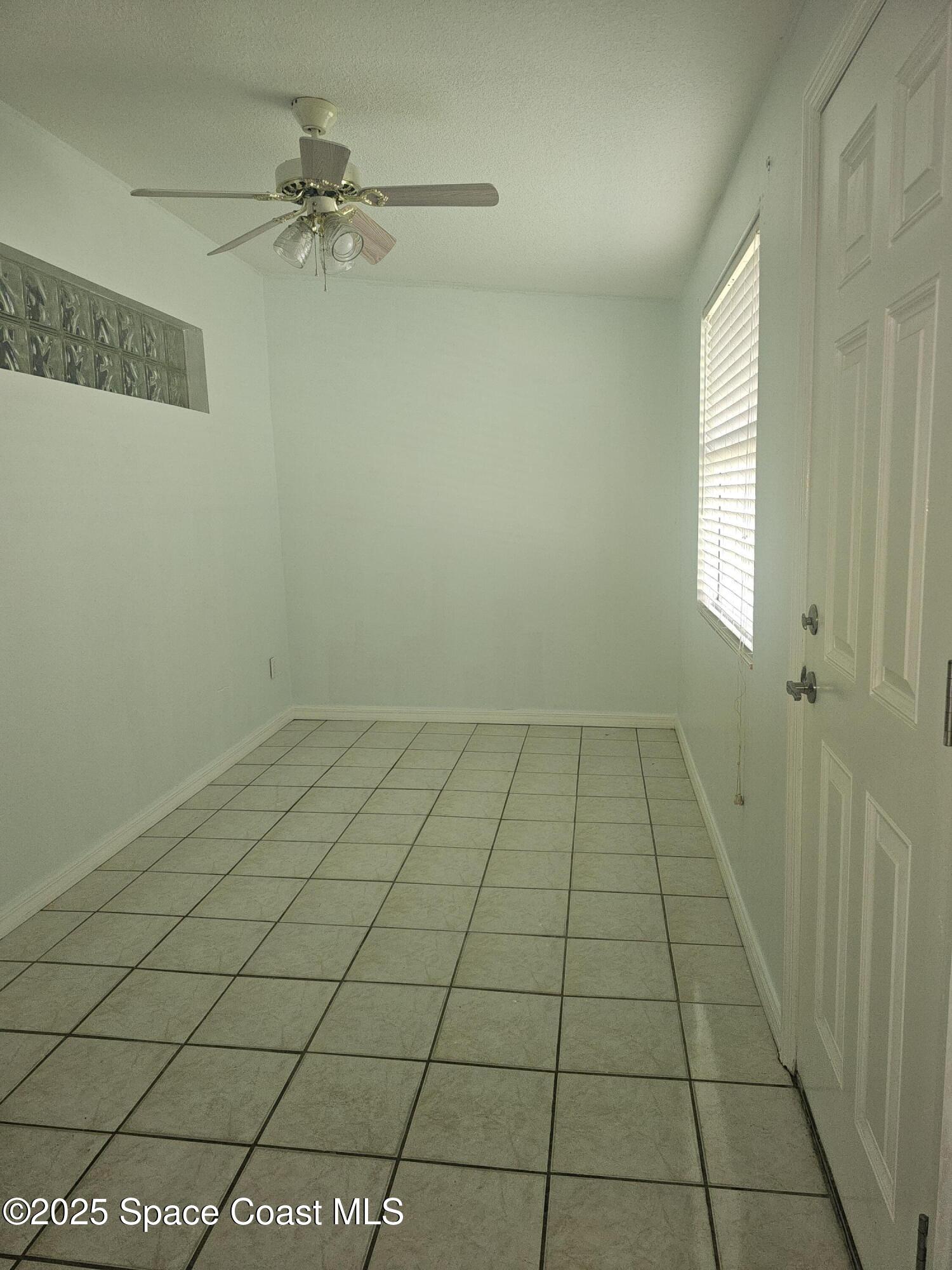 119 Roosevelt Avenue, Unit 119B Cocoa Beach, FL 32931 - Photo 13 of 19 Bedroom 2/Office/Laundry