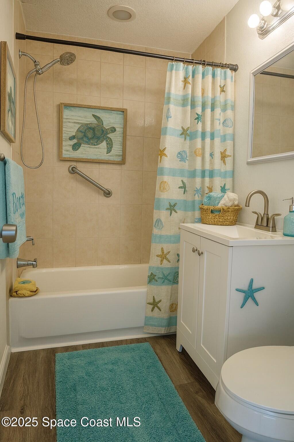 119 Roosevelt Avenue, Unit 119B Cocoa Beach, FL 32931 - Photo 8 of 19 Virtually Staged Bathroom