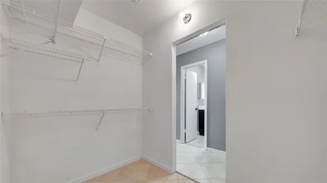 an aerial view of a houses with yard