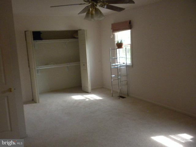 604 Cannon Road Silver Spring, MD 20904 - Photo 3 of 11 an empty room with a empty space and a window