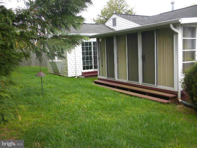 604 Cannon Road Silver Spring, MD 20904 - Photo 6 of 11 a view of a house with a backyard