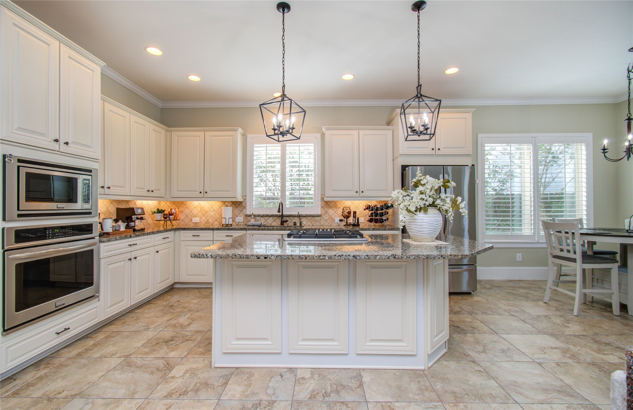 28627 Rolling Ridge Drive Katy, TX 77494 - Photo 17 of 44 a kitchen with stove cabinets and chairs