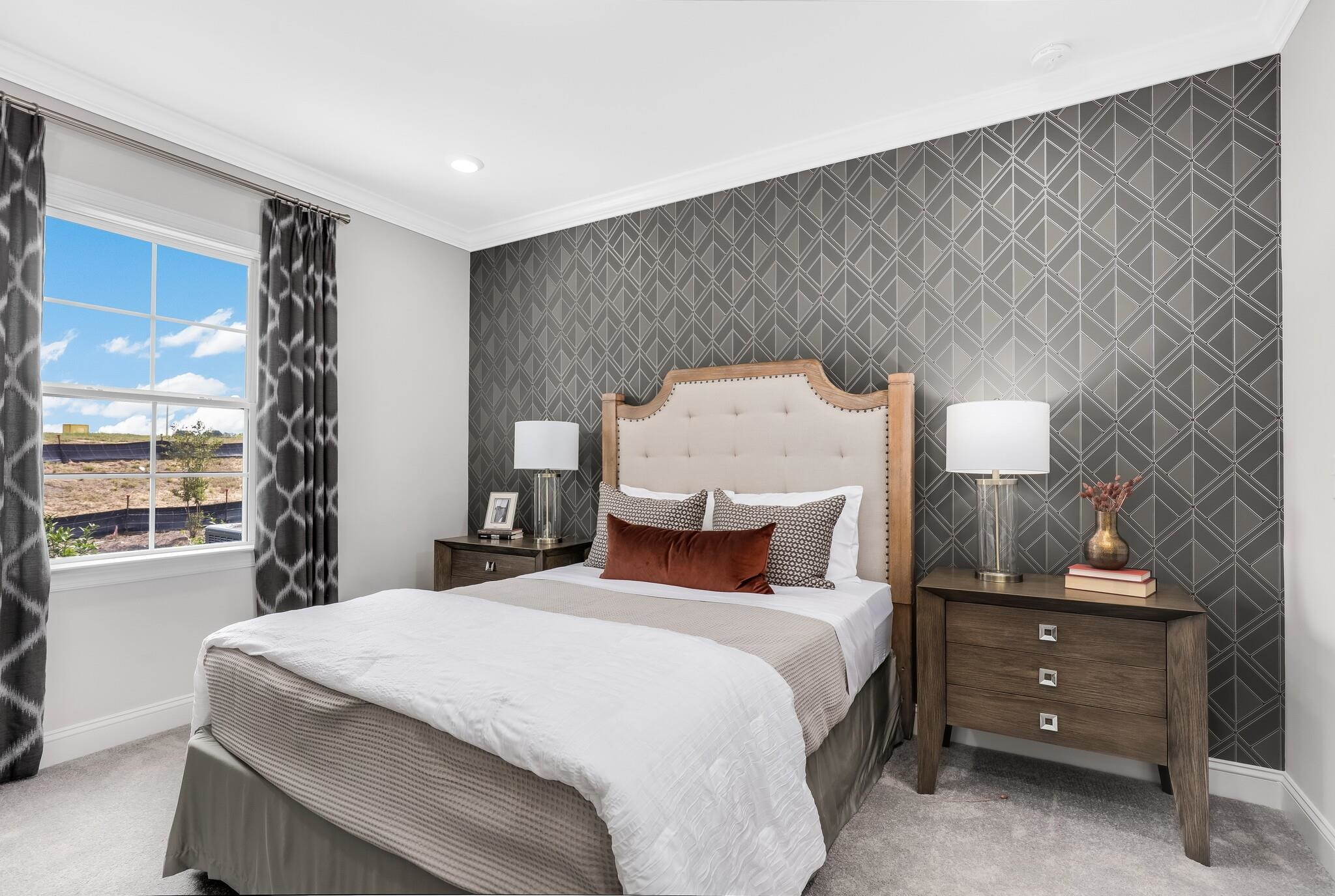 116 Canyon Gap Way, Unit 177 Raleigh, NC 27610 - Photo 19 of 38 a bedroom with a large bed and a window