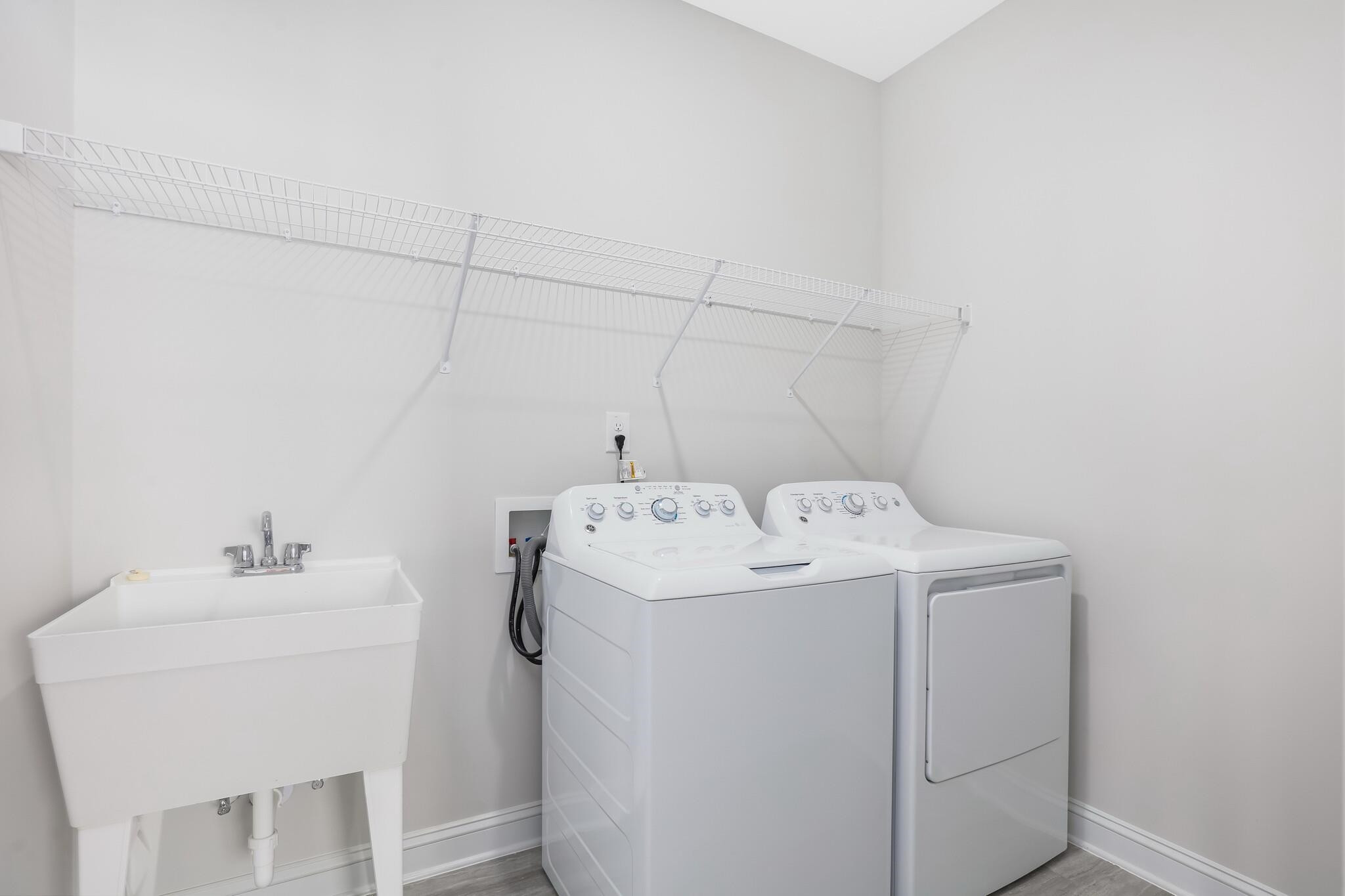 116 Canyon Gap Way, Unit 177 Raleigh, NC 27610 - Photo 24 of 38 a utility room with dryer and washer