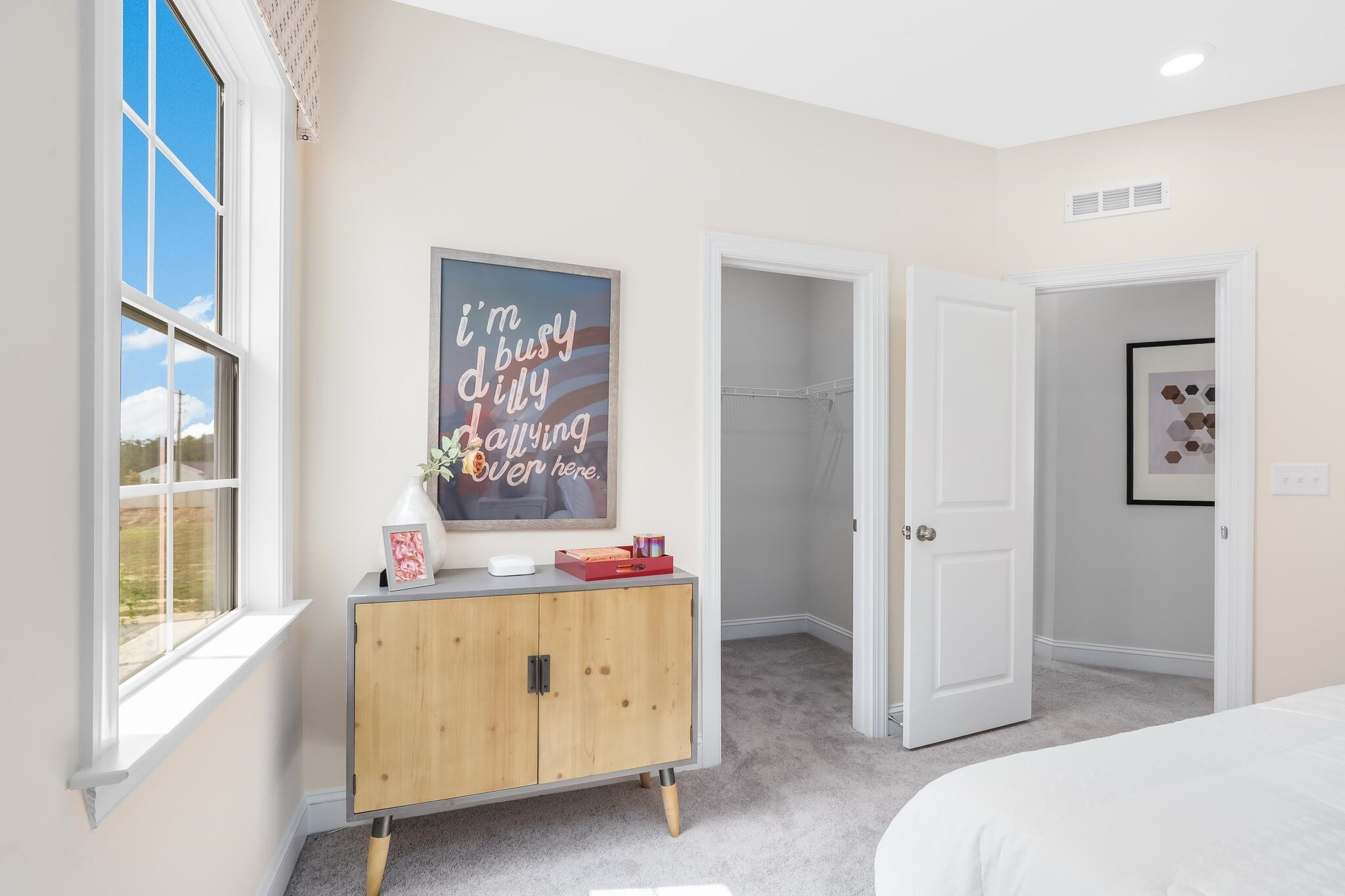 116 Canyon Gap Way, Unit 177 Raleigh, NC 27610 - Photo 33 of 38 a bedroom with a bed and window