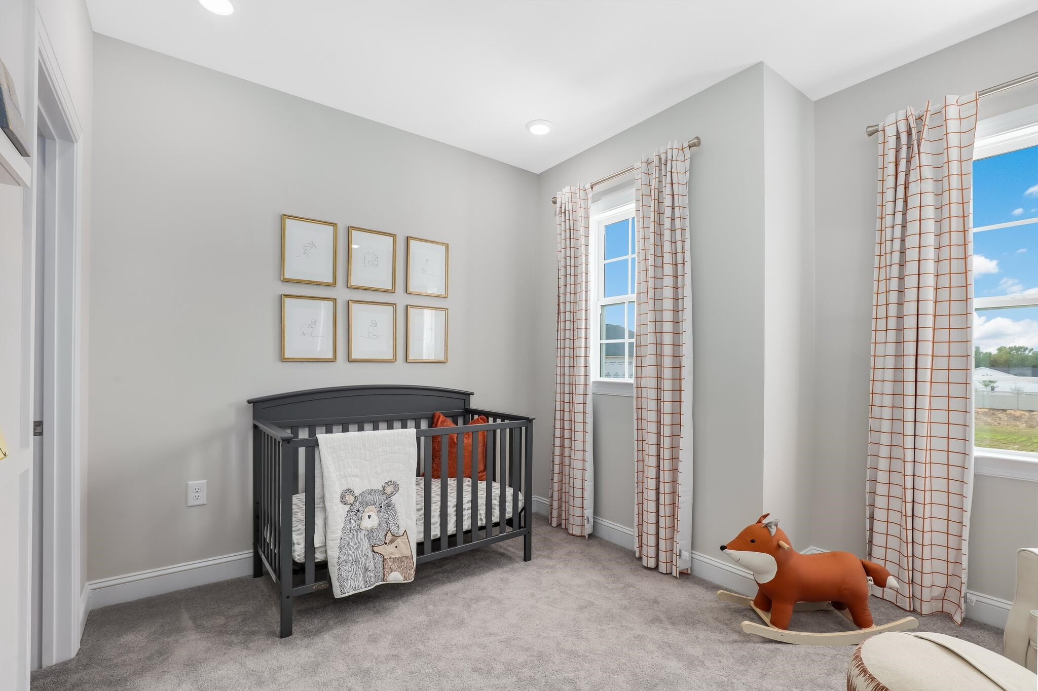 116 Canyon Gap Way, Unit 177 Raleigh, NC 27610 - Photo 34 of 38 a bedroom with a bed and a window