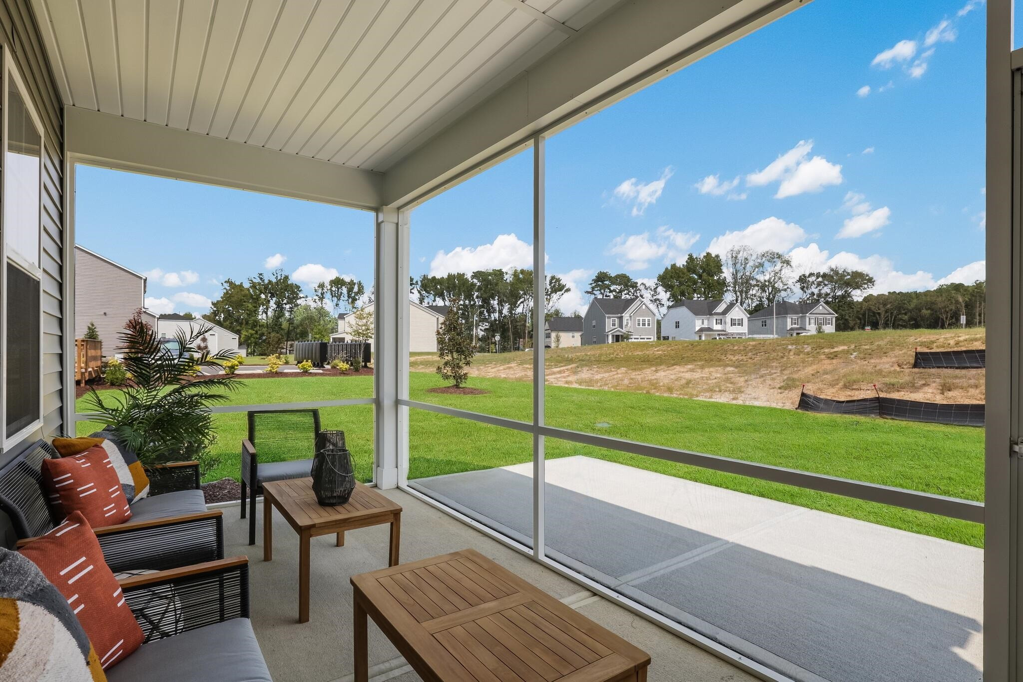 116 Canyon Gap Way, Unit 177 Raleigh, NC 27610 - Photo 37 of 38 a view of a sitting area with furniture and garden view