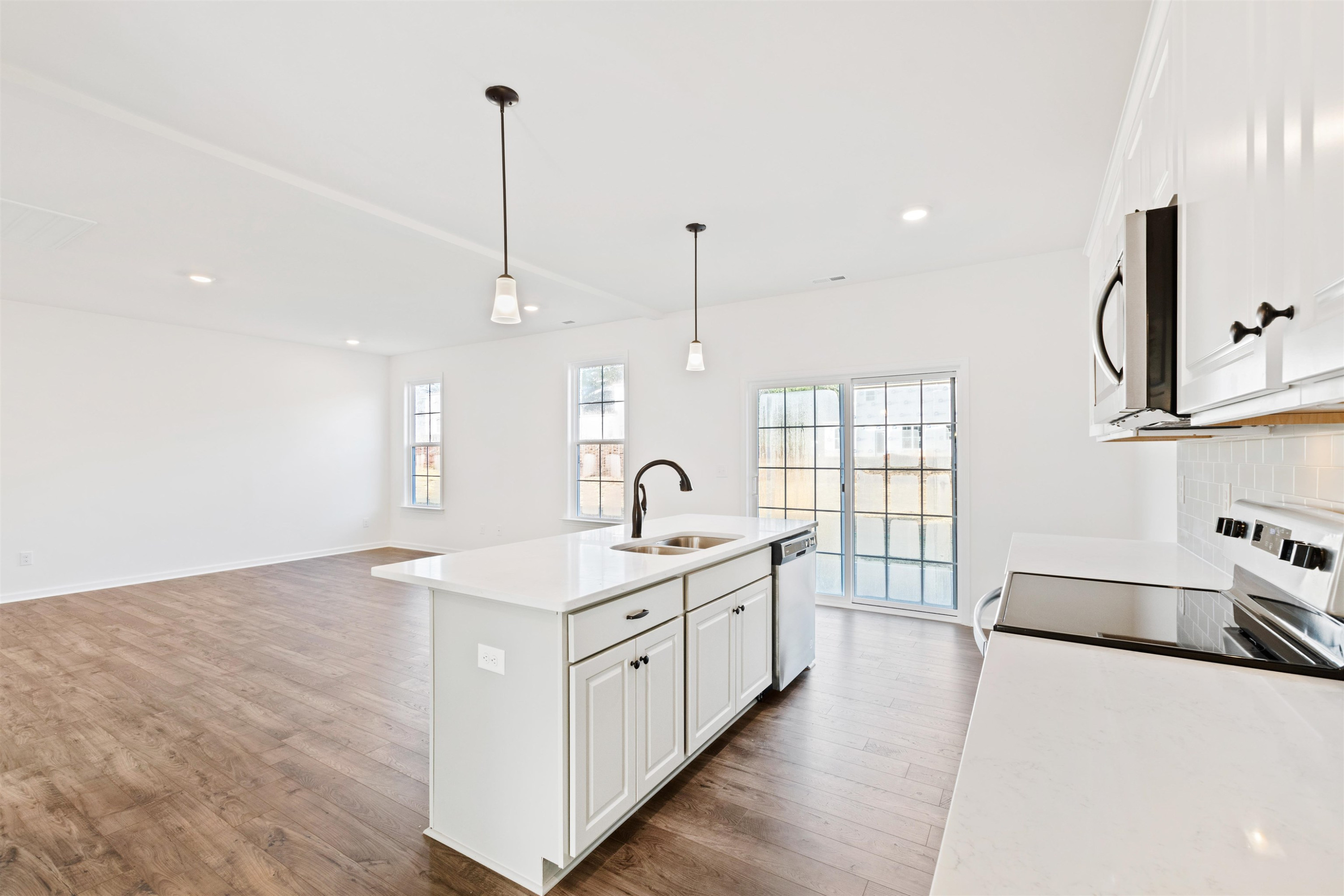 45 Cutshaw Road Youngsville, NC 27596 - Photo 12 of 49 a spacious bathroom with double vanity and a bathtub