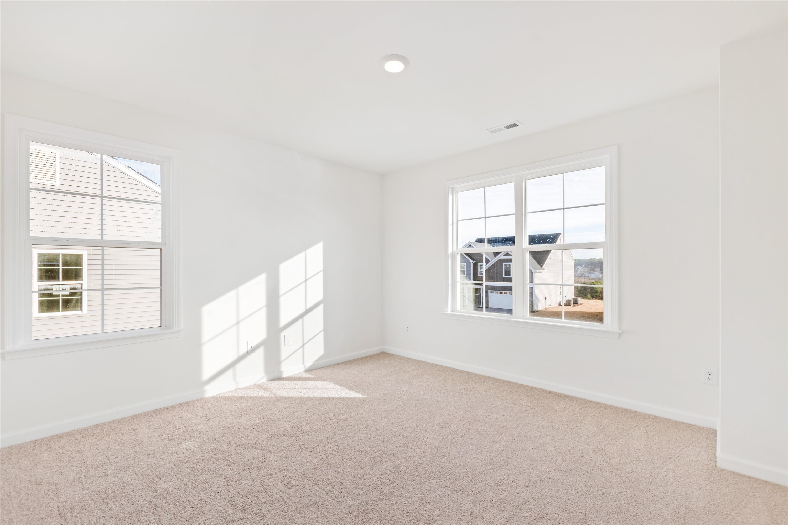 45 Cutshaw Road Youngsville, NC 27596 - Photo 22 of 49 an empty room with a window