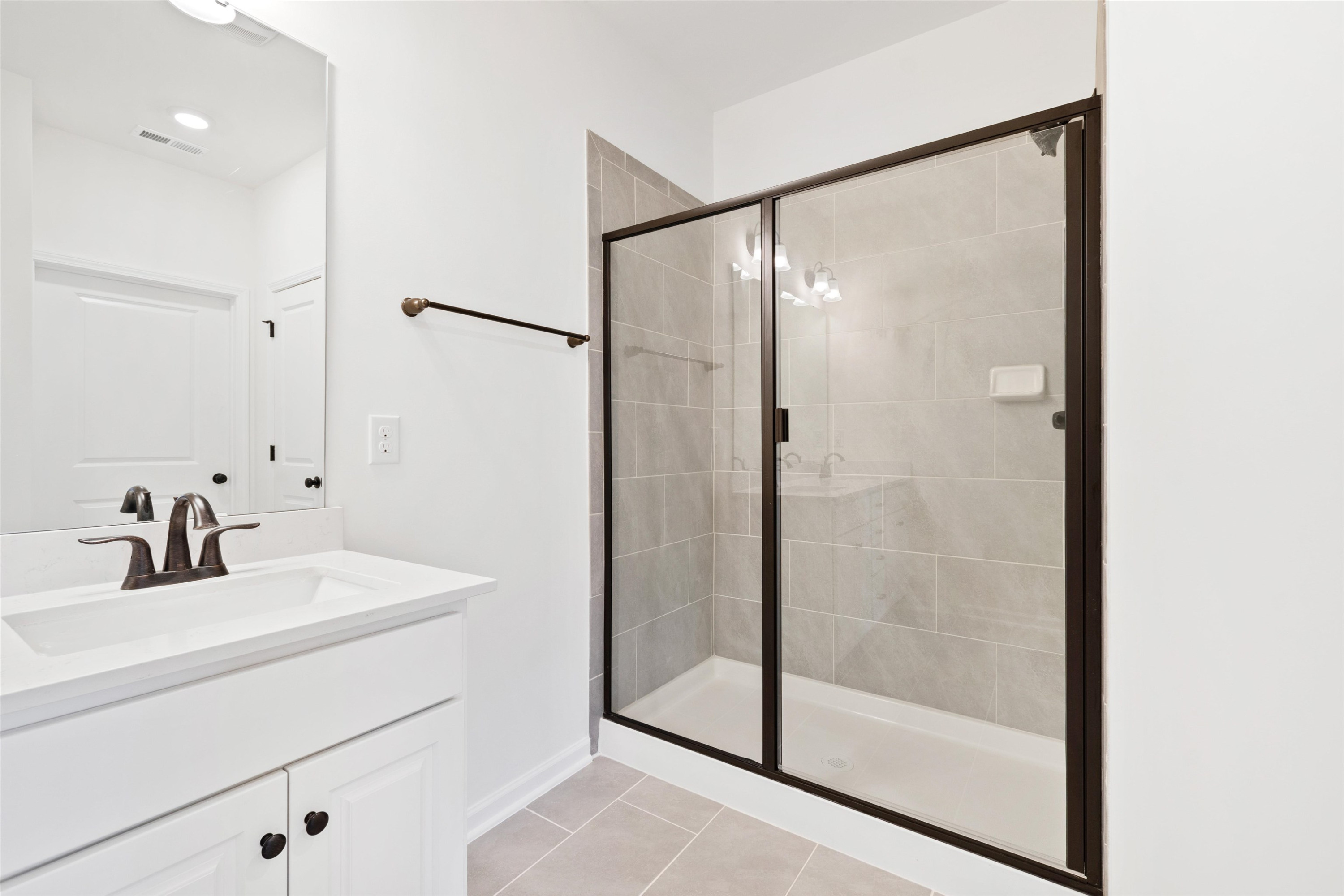 45 Cutshaw Road Youngsville, NC 27596 - Photo 35 of 49 a bathroom with a shower and a sink