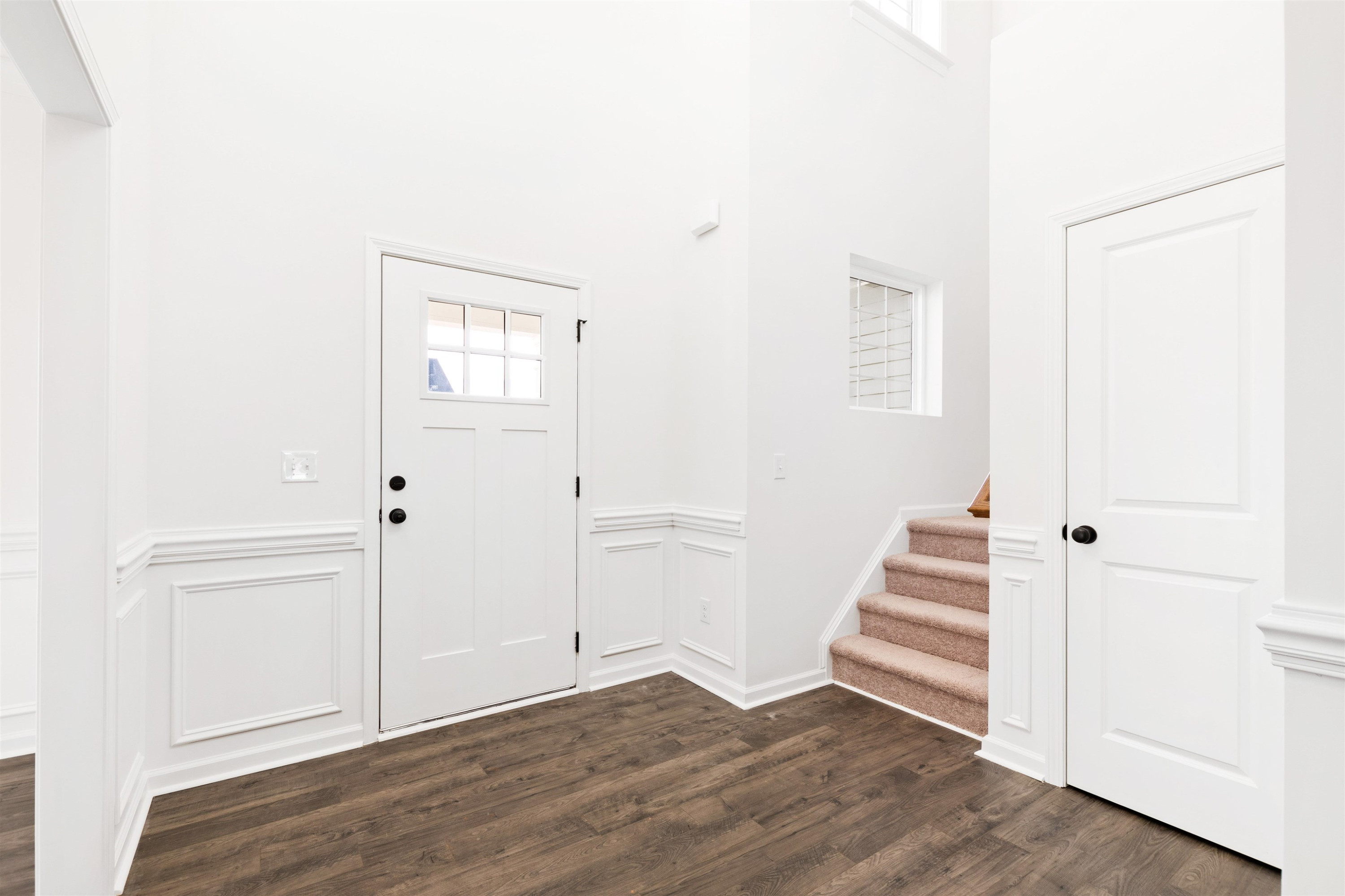 45 Cutshaw Road Youngsville, NC 27596 - Photo 5 of 49 an empty room with wooden floor and white walls