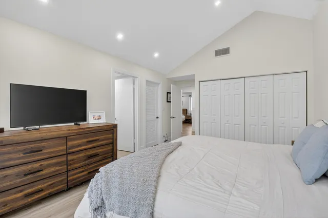 a very nice looking living room with furniture and a large window