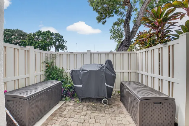 a view of swimming pool with outdoor seating
