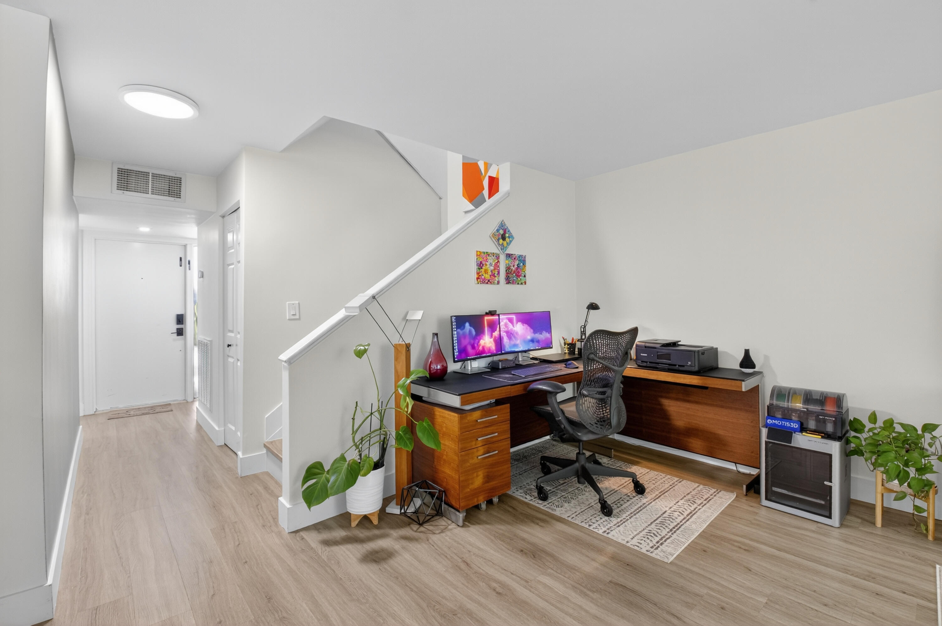 701 Bridgewood Drive Boca Raton, FL 33434 - Photo 4 of 81 a view of a workspace with furniture and wooden floor