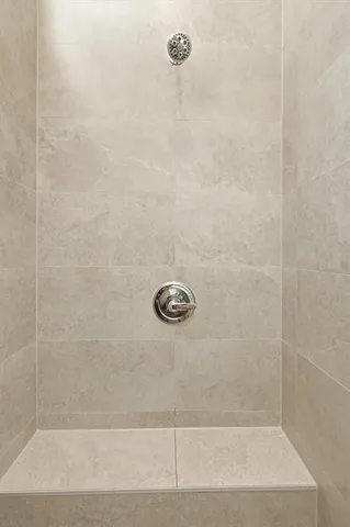 a bathroom with a sink and a shower