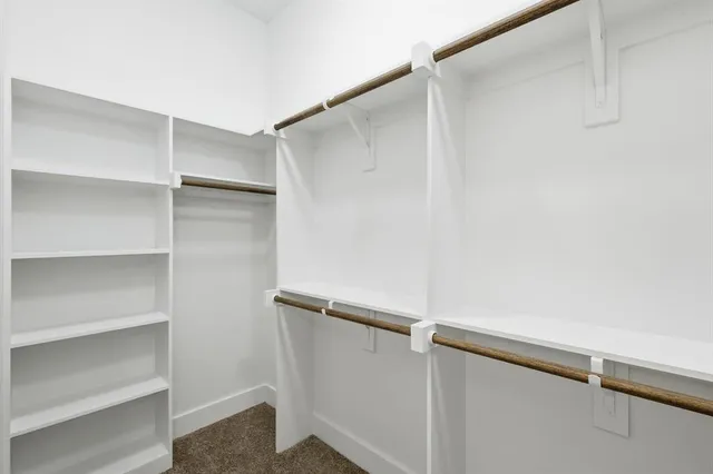 a view of a backyard with garden