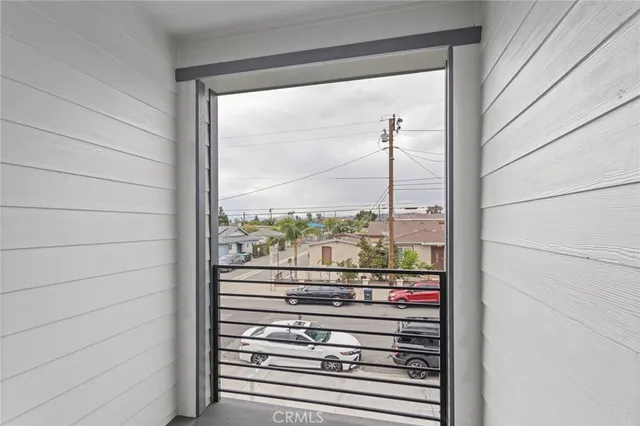 a view of a house with a road