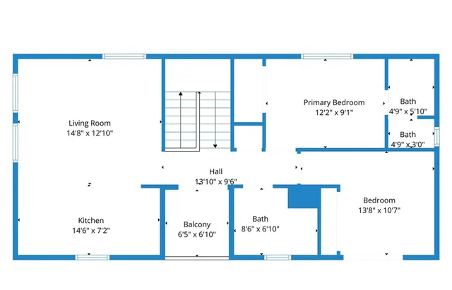 an aerial view of a house with a garden