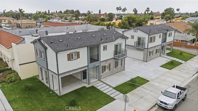 an aerial view of a house with a garden