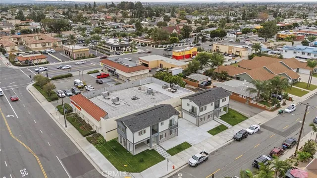 a picture of a bathroom with a white wall