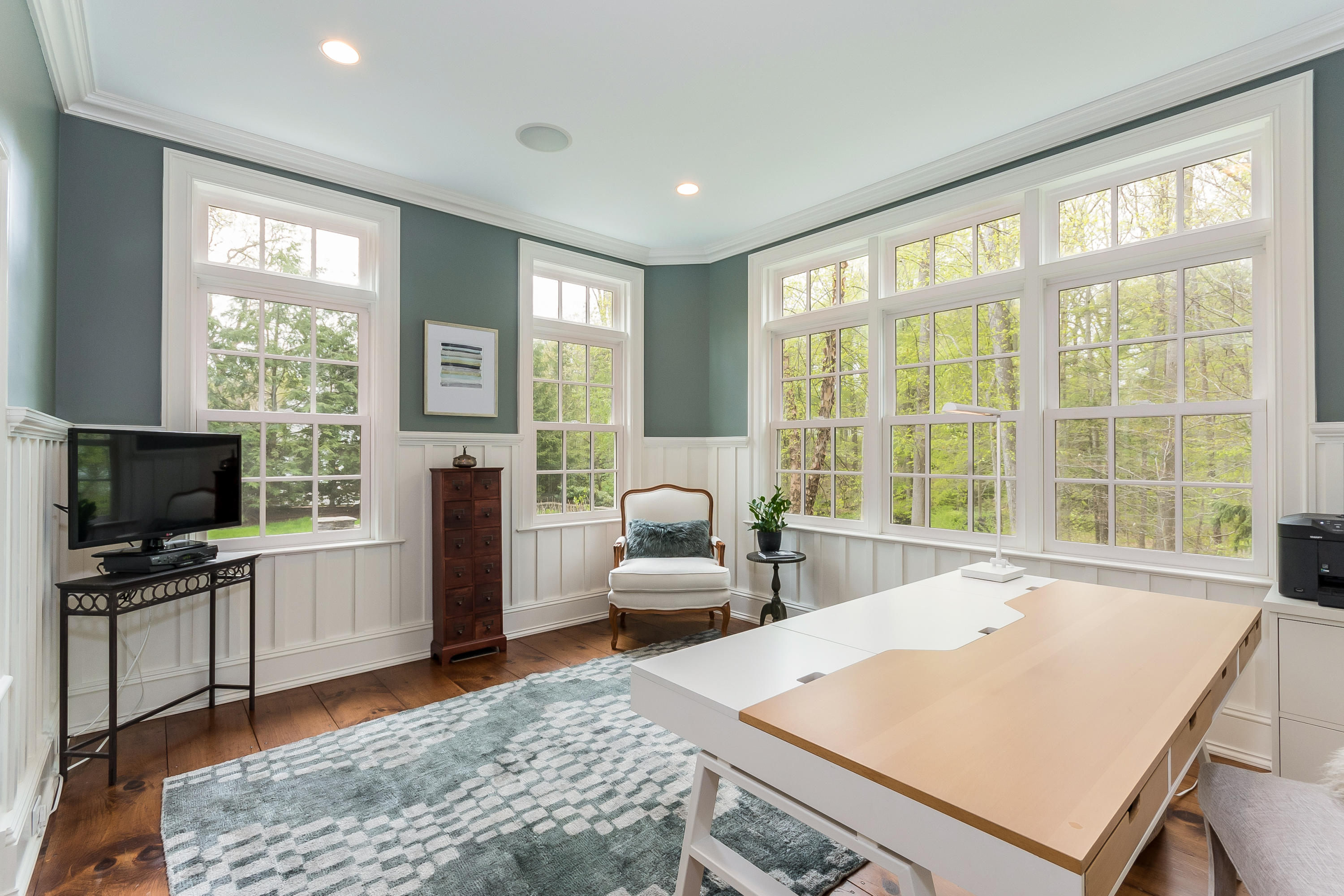 43 Stony Brook Road Darien, CT 06820 - Photo 13 of 46 a living room with furniture and a flat screen tv