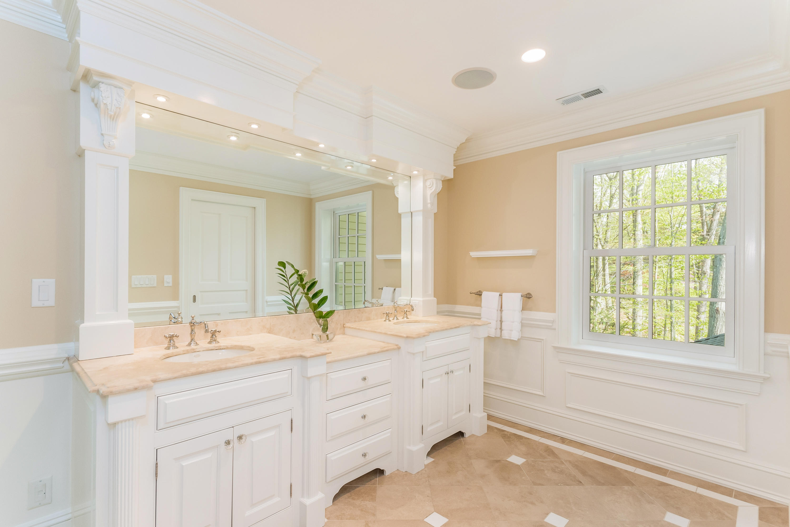 43 Stony Brook Road Darien, CT 06820 - Photo 19 of 46 a bathroom with a sink double vanity and a mirror
