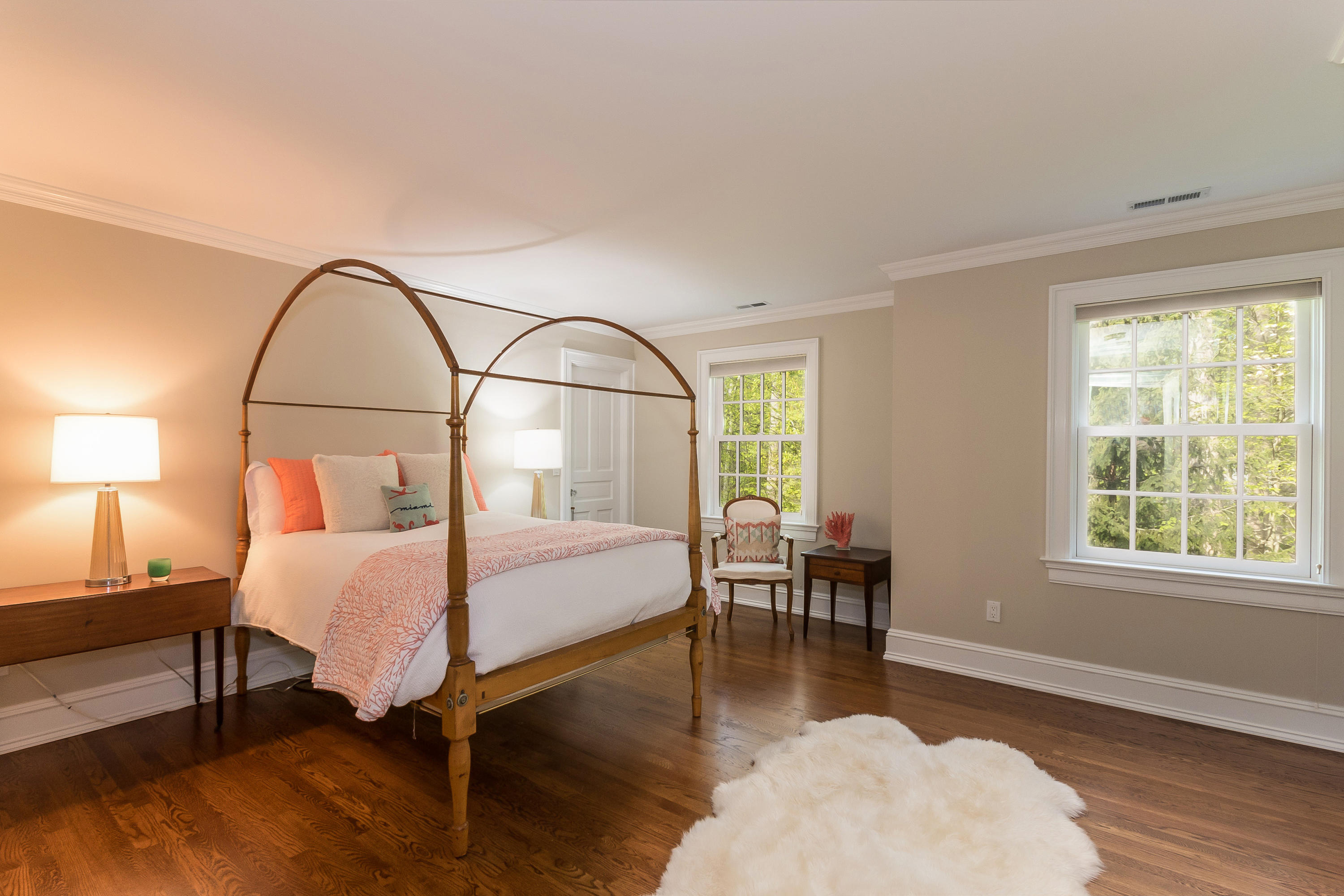 43 Stony Brook Road Darien, CT 06820 - Photo 22 of 46 a bed room with a bed and a chair