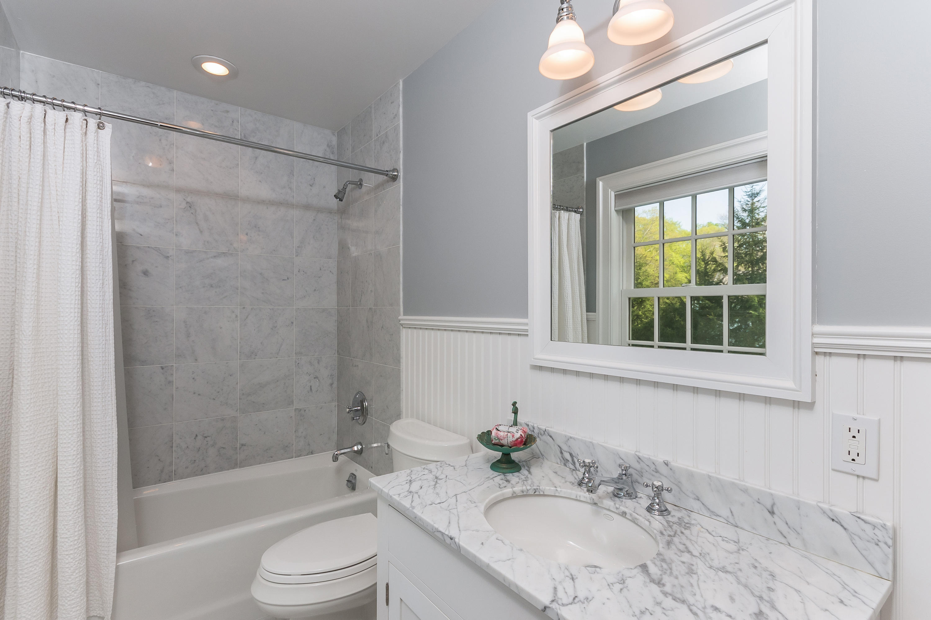 43 Stony Brook Road Darien, CT 06820 - Photo 27 of 46 a bathroom with a granite countertop sink toilet and shower