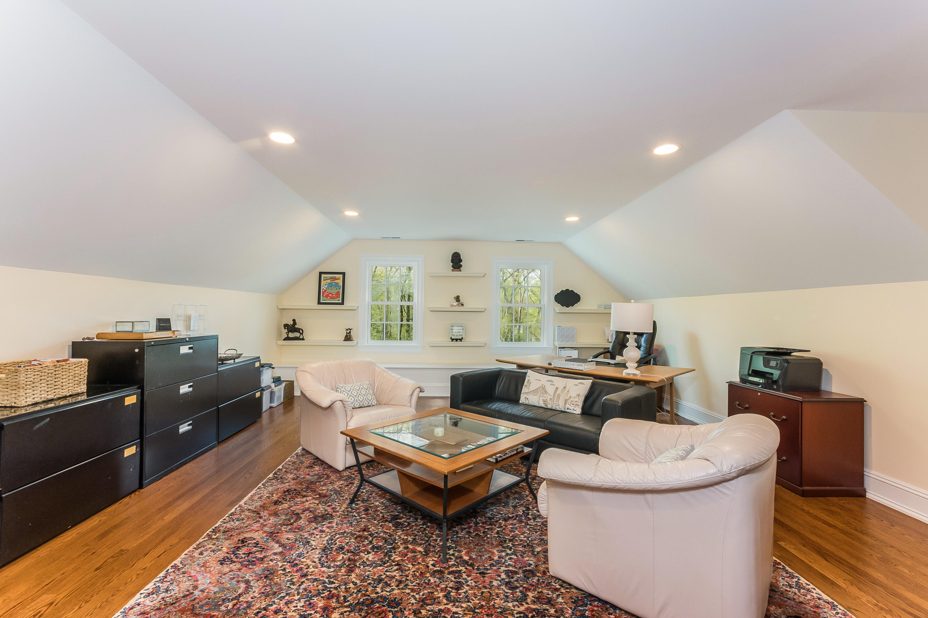43 Stony Brook Road Darien, CT 06820 - Photo 28 of 46 a living room with furniture and a rug