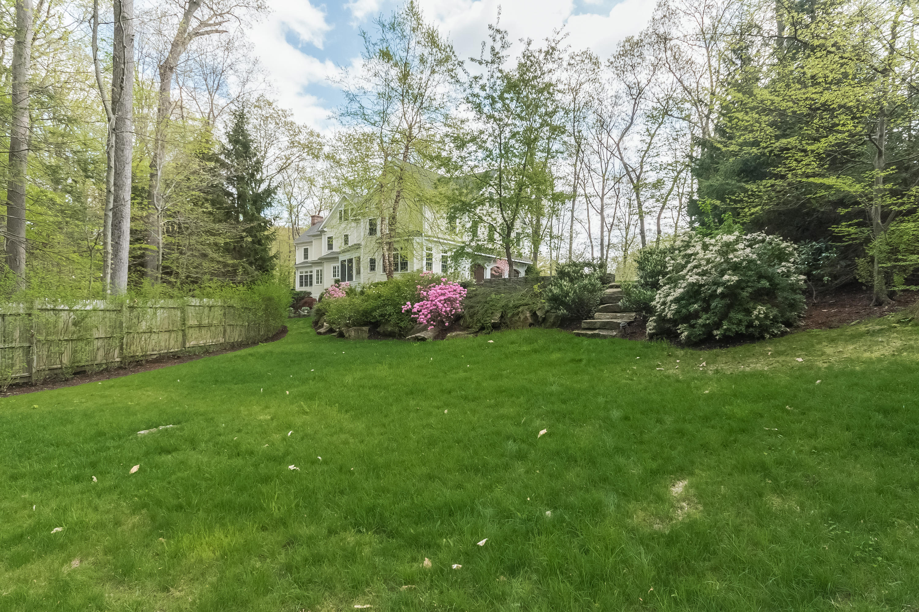 43 Stony Brook Road Darien, CT 06820 - Photo 38 of 46 a view of a field with plants and trees