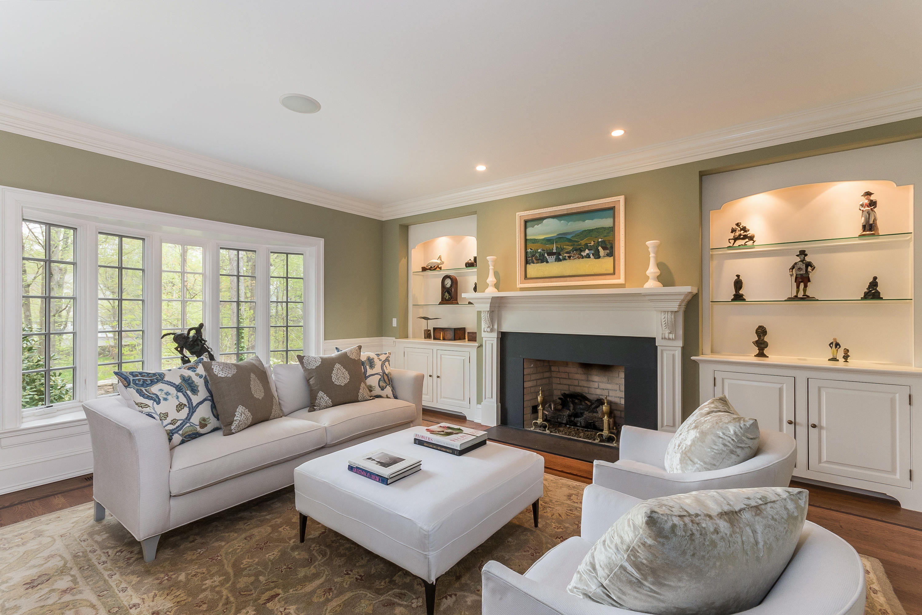 43 Stony Brook Road Darien, CT 06820 - Photo 4 of 46 a living room with furniture and a fireplace