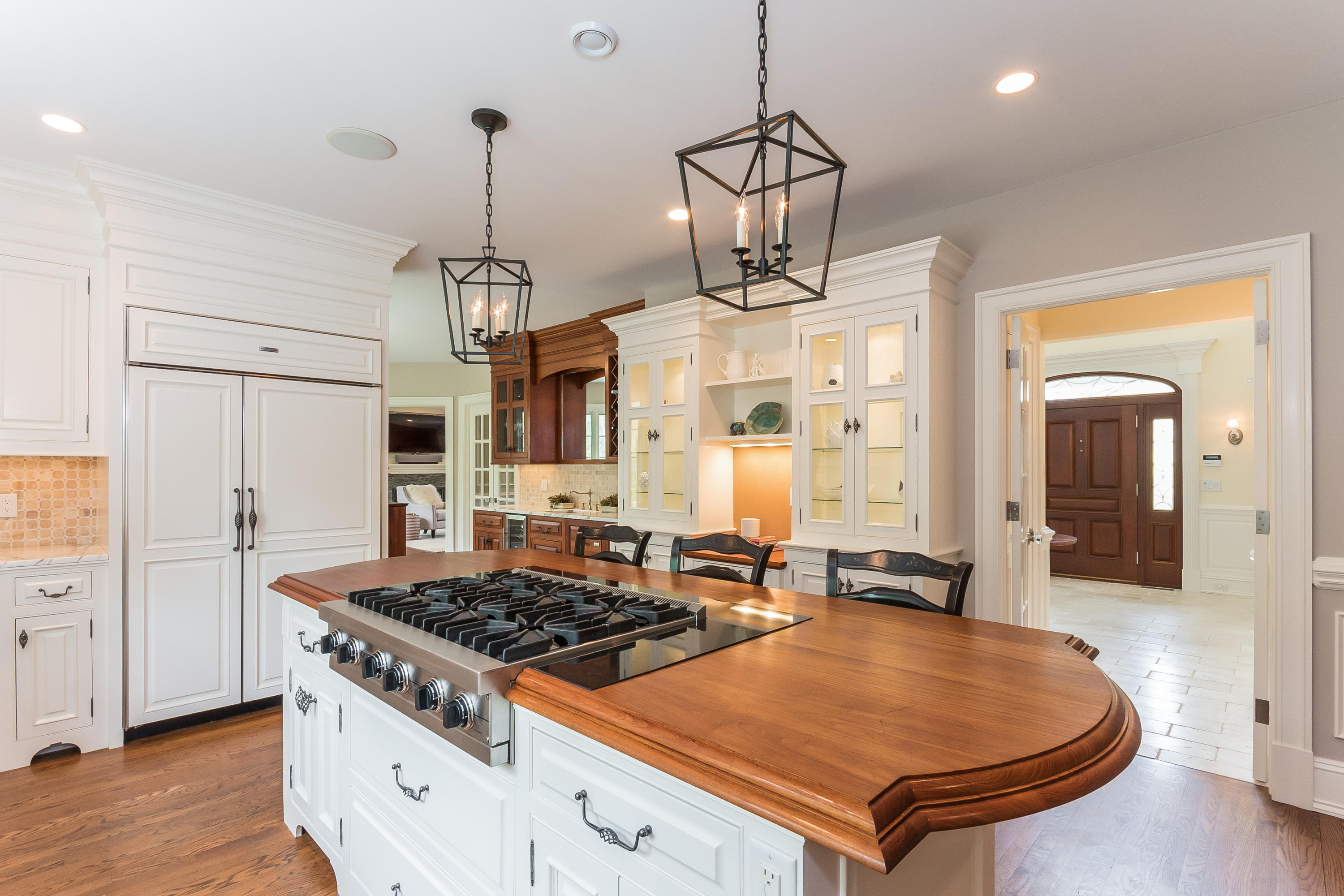 43 Stony Brook Road Darien, CT 06820 - Photo 8 of 46 a kitchen with stainless steel appliances granite countertop a stove a refrigerator and a wooden floors