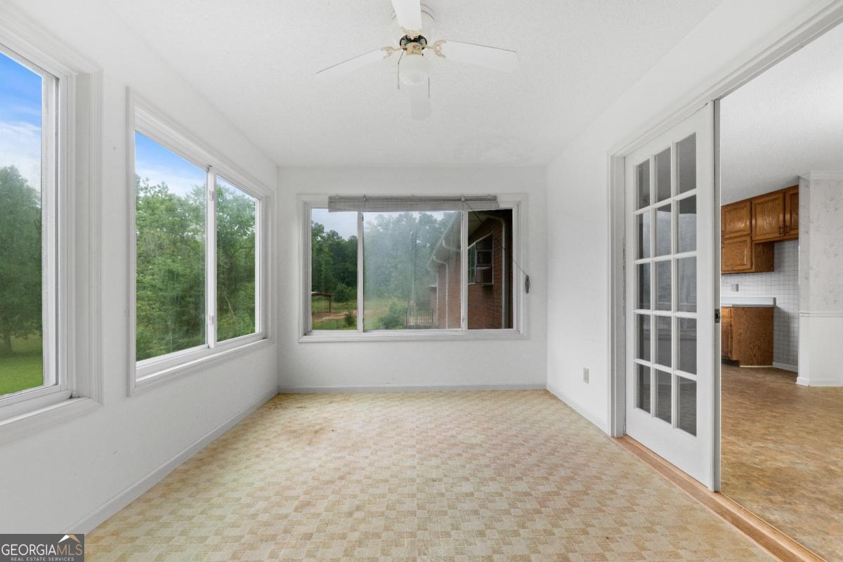 394 Hunter Road Griffin, GA 30224 - Photo 16 of 38 a view of livingroom with furniture window and front door
