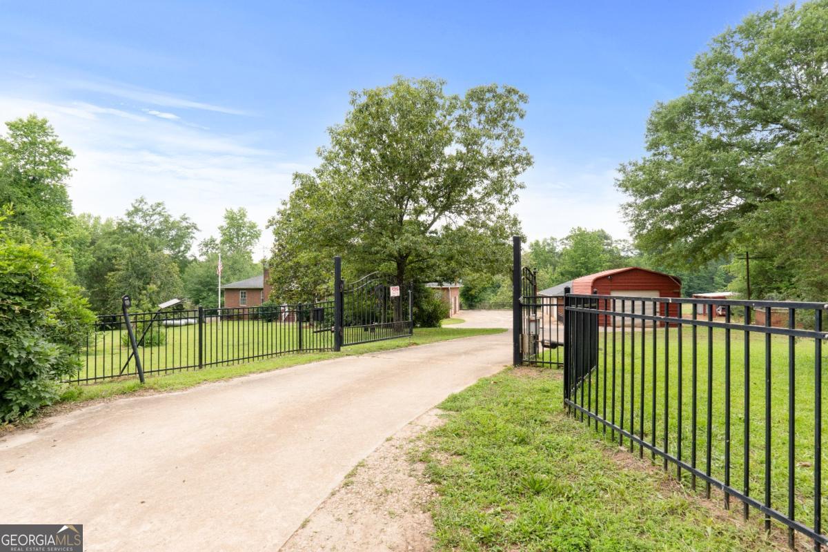 394 Hunter Road Griffin, GA 30224 - Photo 8 of 38 a view of a park with a large trees